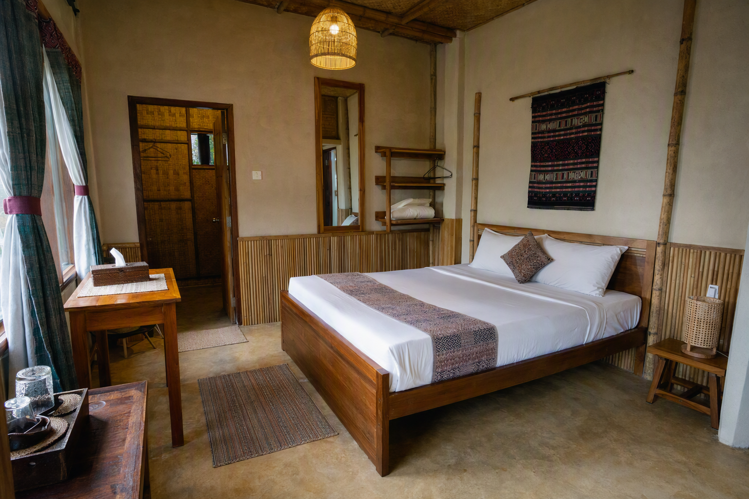 A clean practical Khagrachari guesthouse room with woven textiles and bamboo details