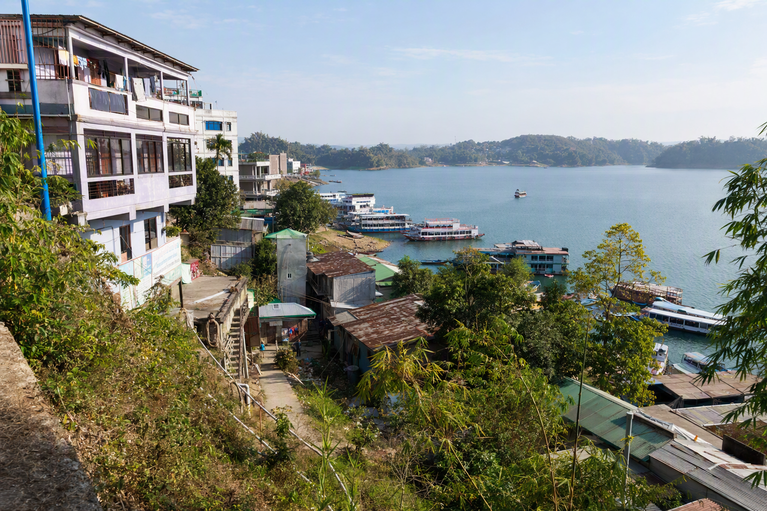 Rangamati waterfront, passenger boats and buildings beside Kaptai Lake