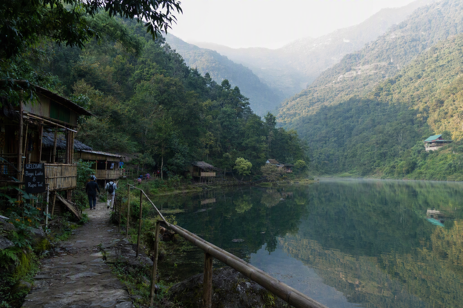 Boga Lake surrounded by steep forested hills